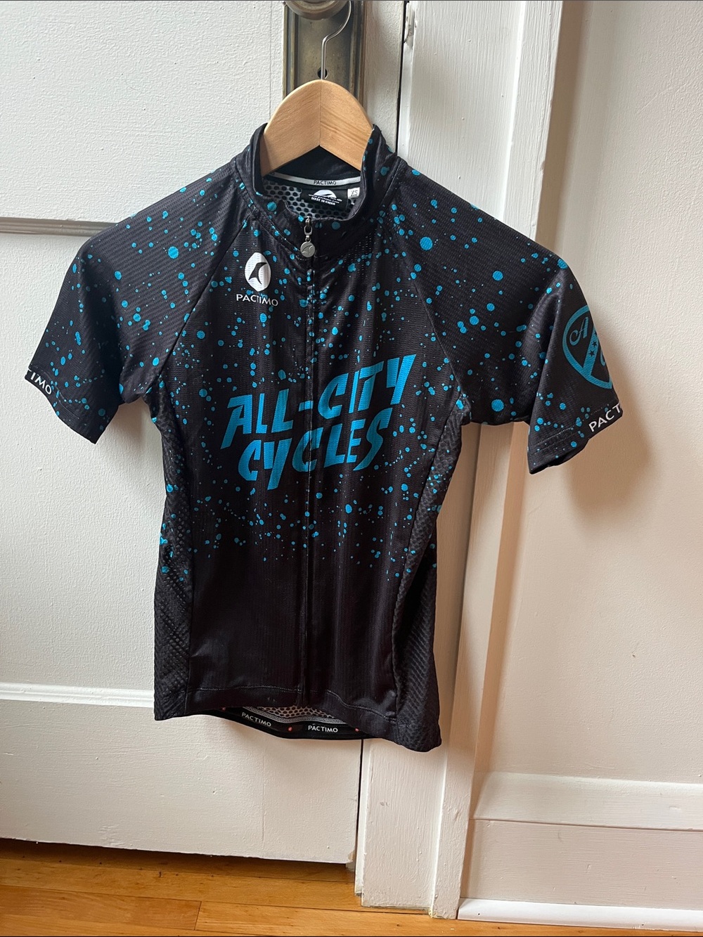 Pactimo Women’s Black Cycling Jersey with Blue All-City Cycles Logo